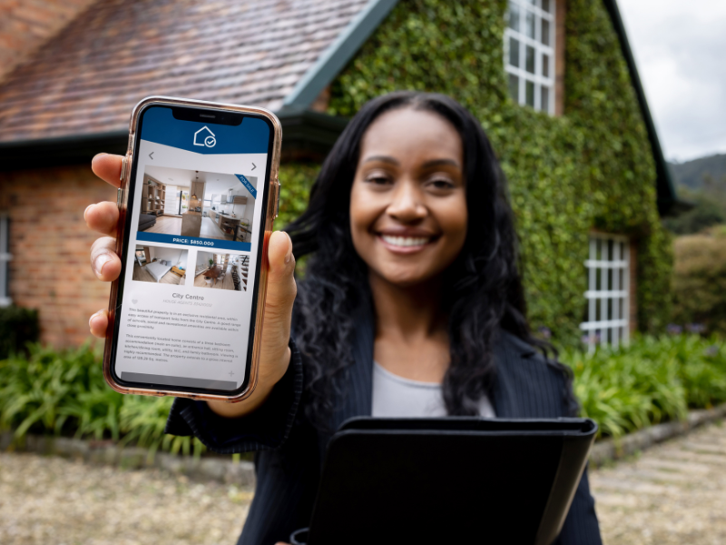 Image of a person using online resources to search for a home.