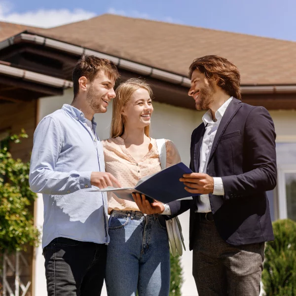 Image of a professional real estate consultant talking to a homeowner.